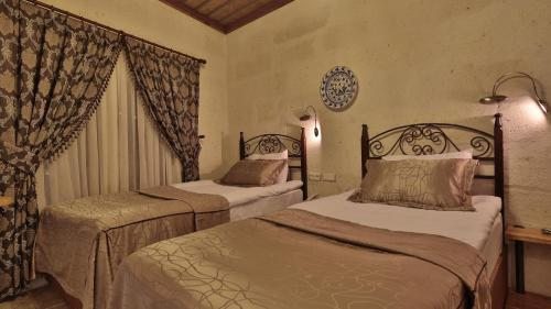 Двухместный (Двухместный номер с 2 отдельными кроватями) отеля Hanzade Suites, Гереме
