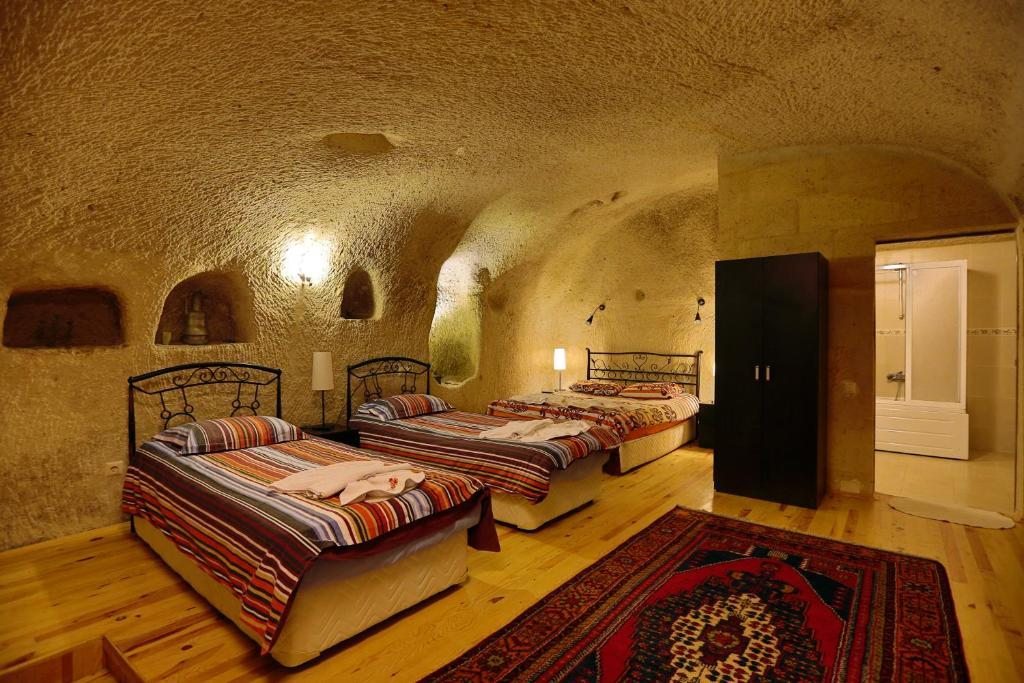 Номер (Кровать в общем номере для женщин с 4 кроватями), Karadut Cave Hotel