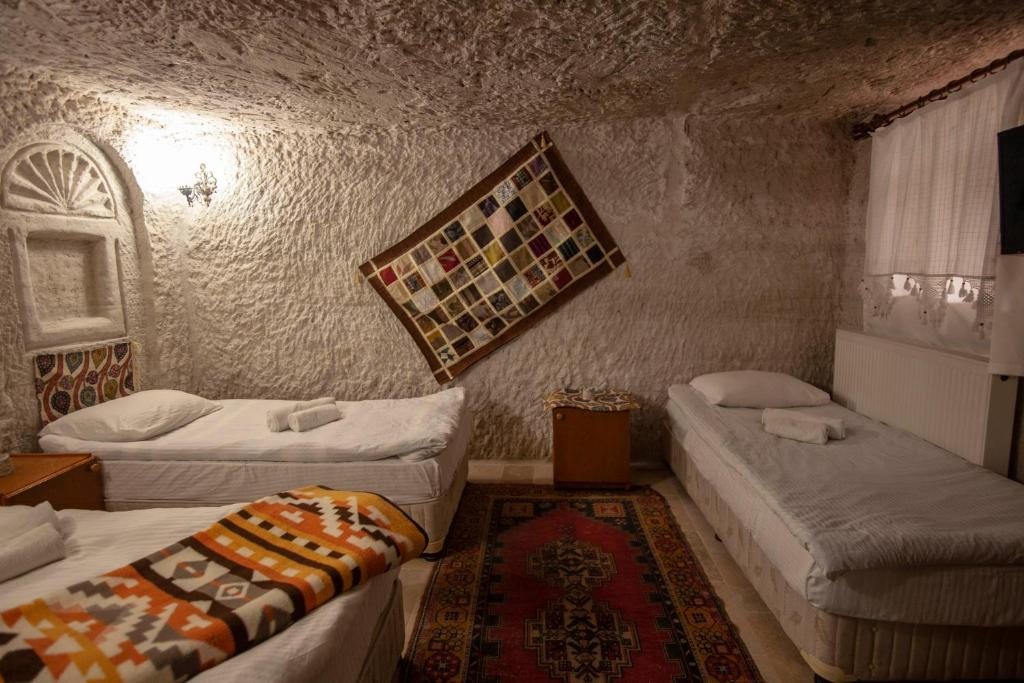 Трехместный (Трехместный номер с ванной комнатой), Nirvana Cave Hotel