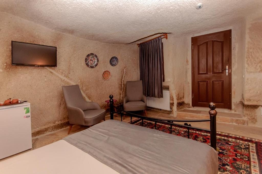 Двухместный (Номер Делюкс с кроватью размера «queen-size») отеля Pearl Cave Hotel, Гереме