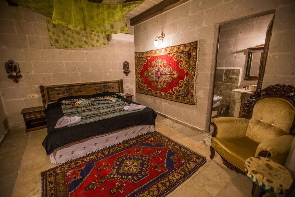 Двухместный (Улучшенный двухместный номер Stone с 1 кроватью) отеля Roc Of Cappadocia, Гереме