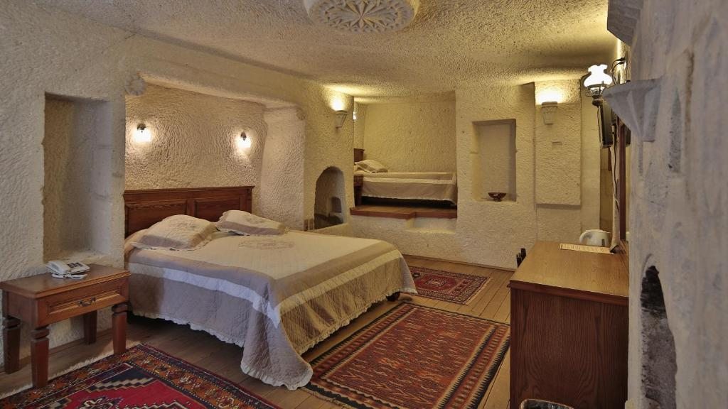 Сьюит (Люкс (для 3 взрослых)) отеля Vezir Cave Suites, Гереме