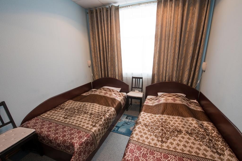 Номер (Односпальная кровать в общем номере с 2 кроватями) отеля Рейс, Дзержинск