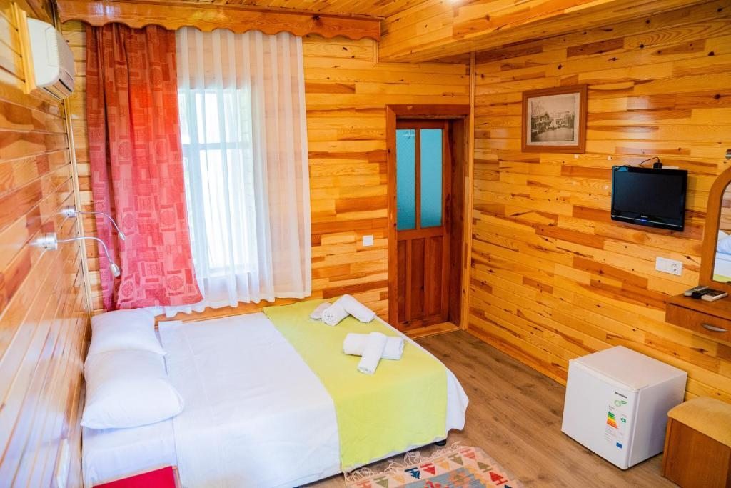 Двухместный (Стандартный двухместный номер с 1 кроватью или 2 отдельными кроватями) парк-отеля Ikiz Pension Bungalow, Чиралы