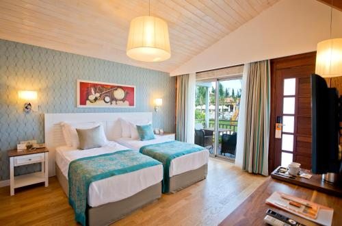 Двухместный (Двухместный номер «Портакал» с 2 отдельными кроватями) курортного отеля Kimera Hotel, Чиралы