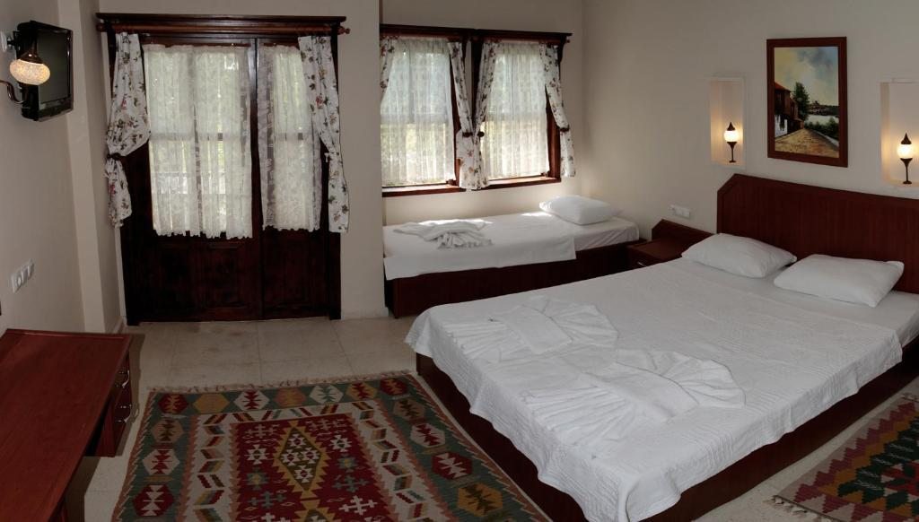 Двухместный (Двухместный номер с 1 кроватью или 2 отдельными кроватями) отеля Nerissa, Чиралы