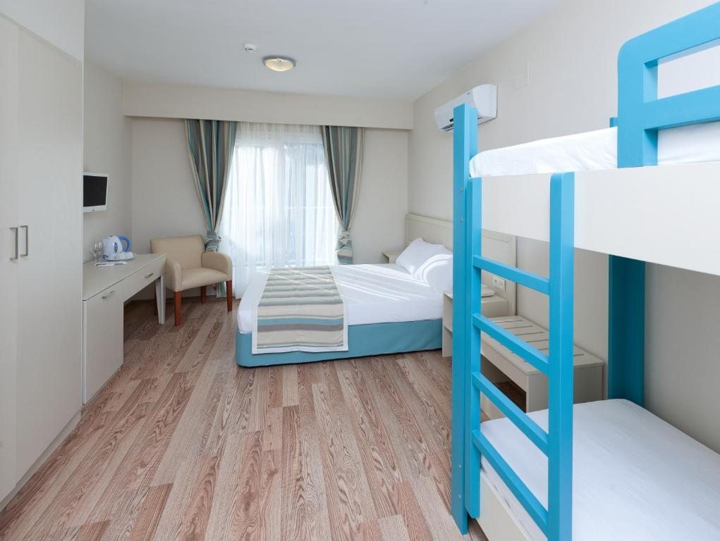 Семейный (Семейный номер (для 2 взрослых и 2 детей)) курортного отеля Bodrum Beach Resort, Гюмбет
