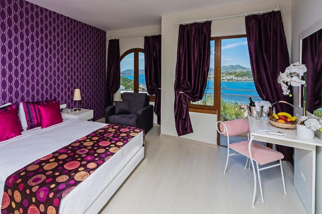 Двухместный (Улучшенный двухместный номер с 1 кроватью или 2 отдельными кроватями) отеля Riva Bodrum Resort- Adult Only +16, Гюмбет