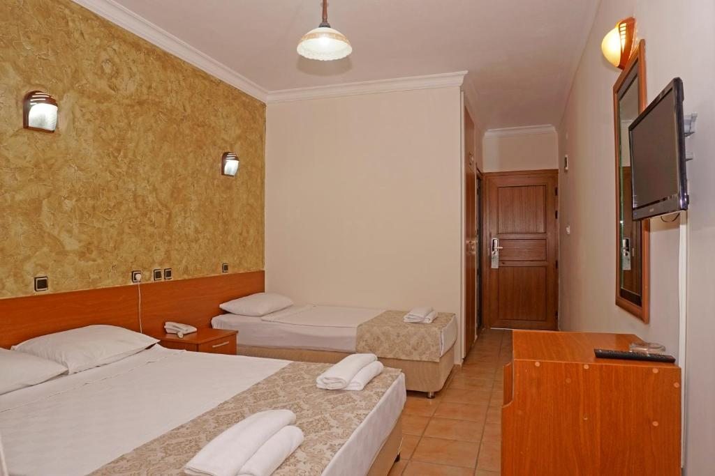 Двухместный (Стандартный двухместный номер с 1 кроватью или 2 отдельными кроватями) отеля Anil with pool, Гюмбет