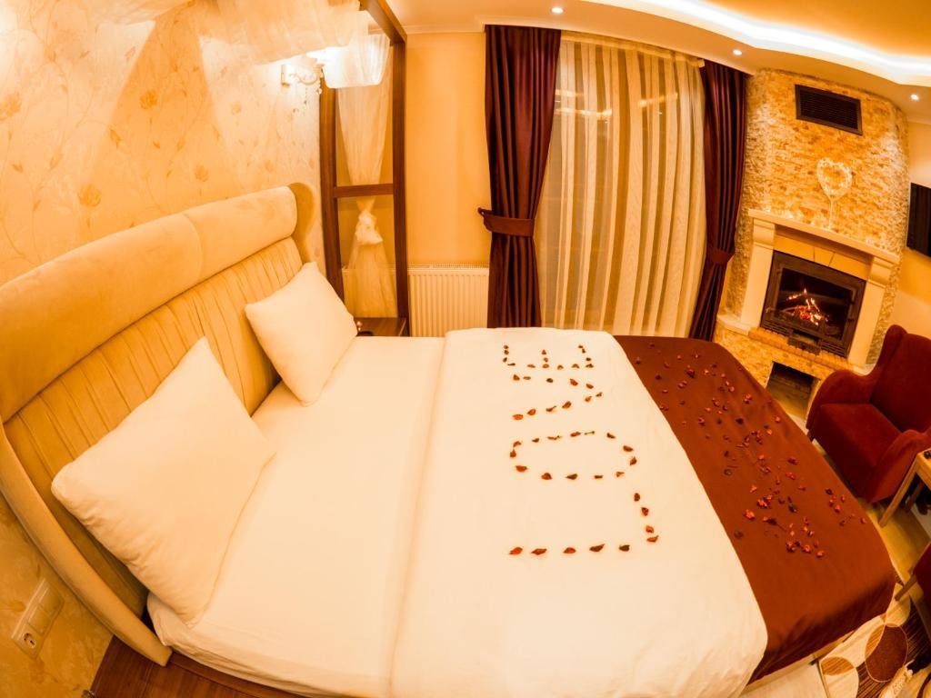 Сьюит (Honeymoon Room with Fireplace and Spa Bath) отеля Elif Inan Motel, Узунгель
