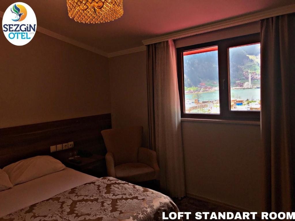Двухместный (Небольшой двухместный номер с 1 кроватью и видом на озеро, мансардный этаж) отеля Sezgin Hotel, Узунгель