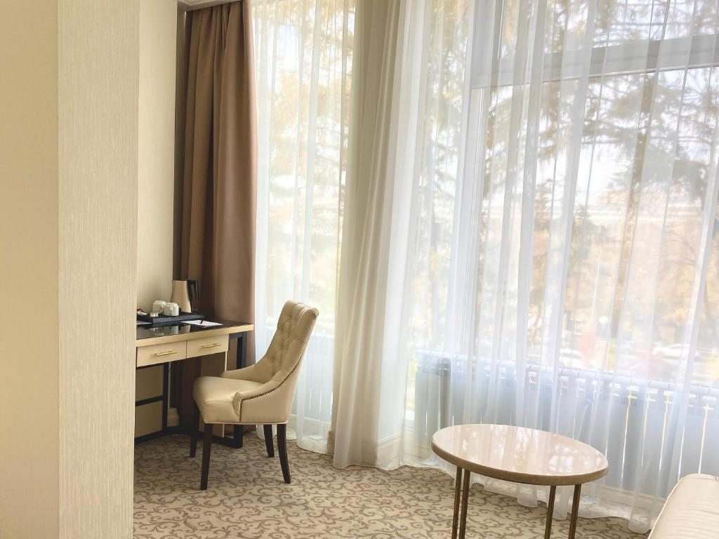Двухместный (Улучшенный двухместный номер с 1 кроватью или 2 отдельными кроватями) отеля 7 Avenue Hotel and SPA, Самара
