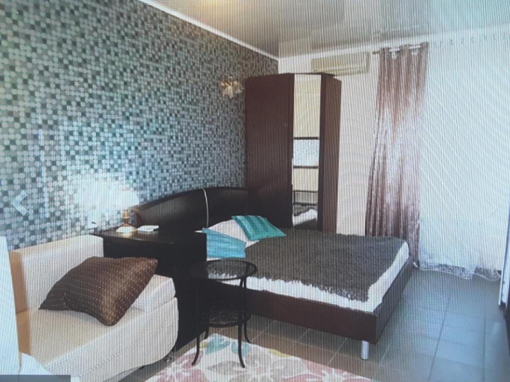 Двухместный (Двухместный номер Делюкс с 1 кроватью или 2 отдельными кроватями) гостевого дома Розовый рай, Лазаревское