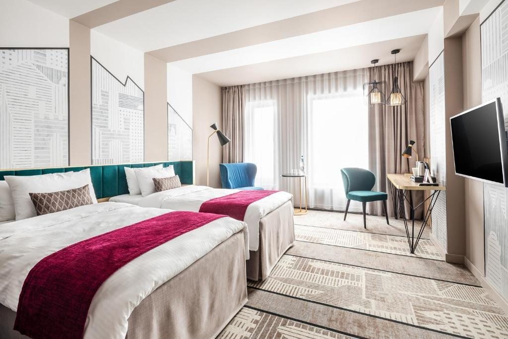 Двухместный (Стандартный двухместный номер с 2 отдельными кроватями и видом на озеро) отеля Mercure Kaliningrad, Калининград