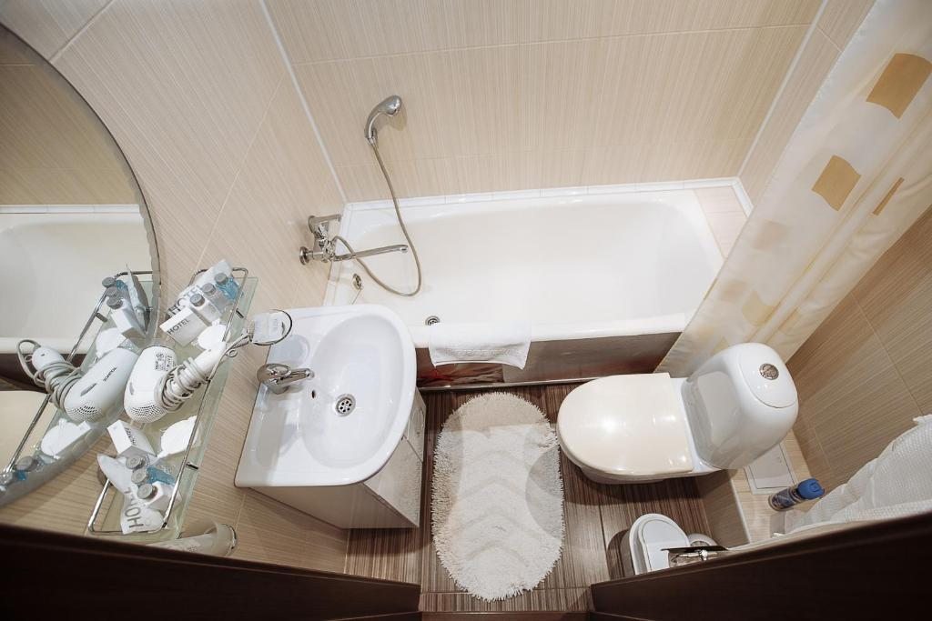 Двухместный (Двухместный номер с 2 отдельными кроватями и ванной комнатой) гостиницы Аркада, Ачинск