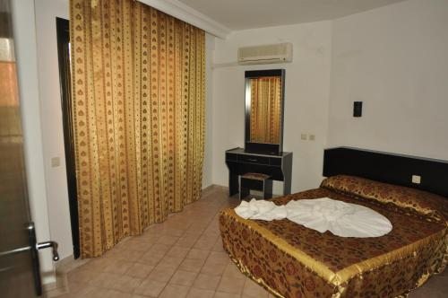 Одноместный (Классический одноместный номер с балконом) отеля Gold Twins Suit Hotel, Махмутлар