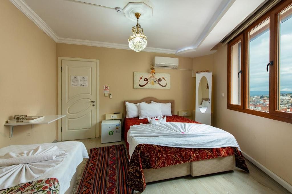 Семейный (Cемейный номер с собственной ванной комнатой) отеля Ephesus Palace, Сельчук