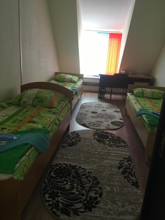 Номер (Кровать в общем 4-местном номере для мужчин и женщин) хостела Магистраль, Ноябрьск