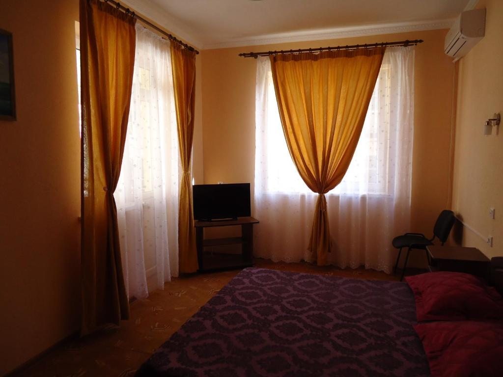 Двухместный (Двухместный номер с 1 кроватью или 2 отдельными кроватями и балконом) гостевого дома Гардения, Лоо