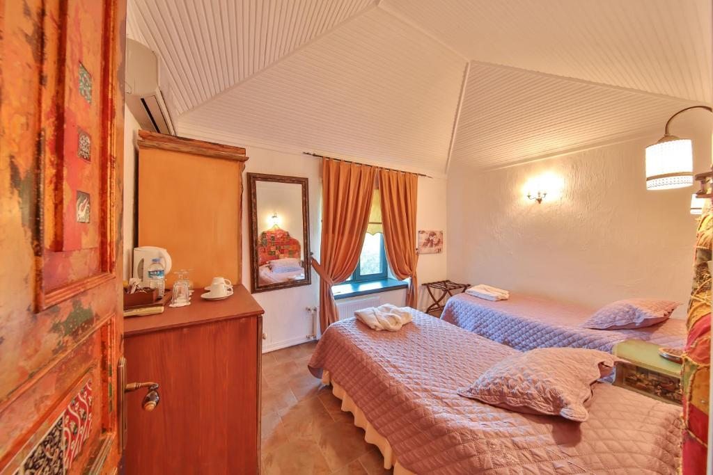 Двухместный (Двухместный номер с 1 кроватью или 2 отдельными кроватями) отеля Cetmihan Hotel, Кючюккую