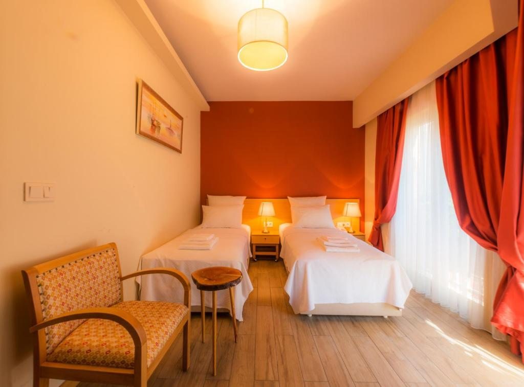 Двухместный (Улучшенный двухместный номер с 2 отдельными кроватями) отеля Esida Hotel, Кючюккую