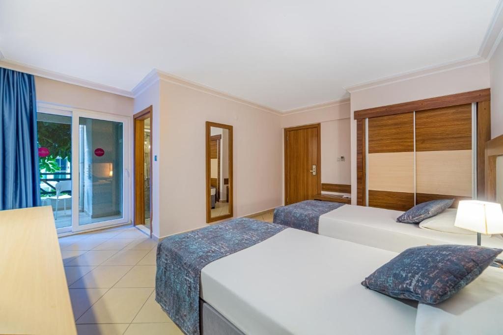 Двухместный (Стандартный двухместный номер с 1 кроватью или 2 отдельными кроватями) курортного отеля Justiniano Club Alanya, Окурджалар