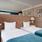Улучшенный двухместный номер с 2 отдельными кроватями в отеле «Ахиллес и Черепаха»
