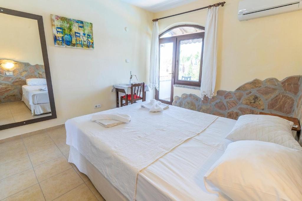 Двухместный (Стандартный двухместный номер с 1 кроватью или 2 отдельными кроватями) отеля Hotel Xanthos Patara, Патара