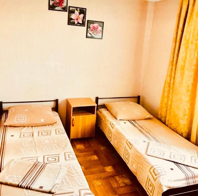 Двухместный (Двухместный номер с 2 отдельными кроватями и ванной комнатой) гостевого дома Уют, Краснодар