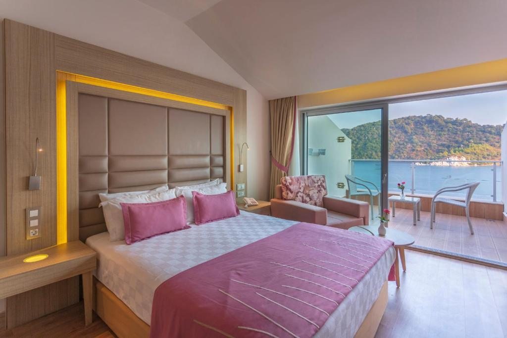 Двухместный (Стандартный двухместный номер с 1 кроватью или 2 отдельными кроватями, вид на море) отеля Sentido Orka Lotus Beach, Ичмелер