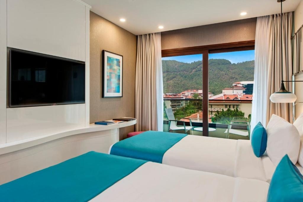 Elite world marmaris 4. Элит ворлд Мармарис. Elite World Marmaris Hotel. Отель Мармари Ольгинка.