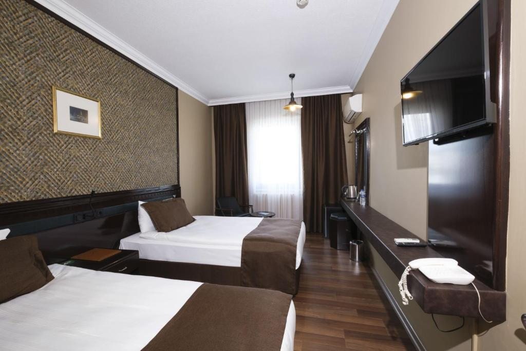 Двухместный (Стандартный двухместный номер с 2 отдельными кроватями) отеля Balikcilar Hotel, Конья