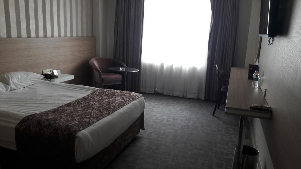 Двухместный (Стандартный двухместный номер с 1 кроватью или 2 отдельными кроватями) отеля Baykara, Конья