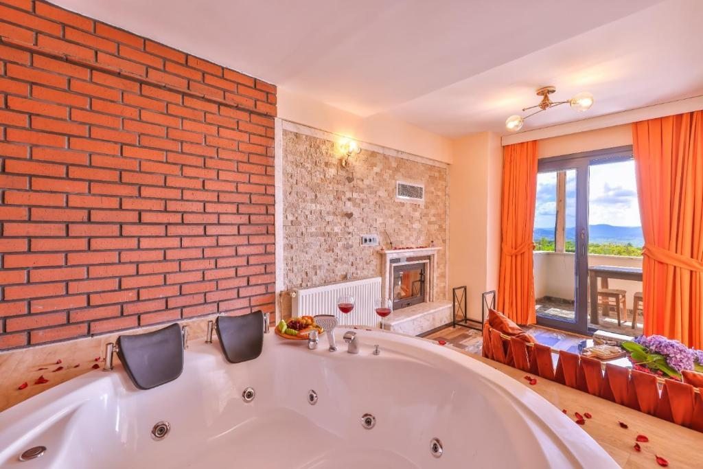 Номер (Бунгало Делюкс с гидромассажной ванной и видом на море) отеля Agva Teras Garden, Агва