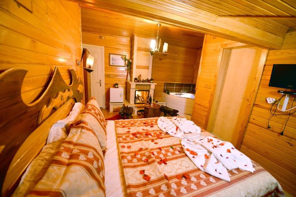 Двухместный (Двухместный номер Делюкс с 1 кроватью, камином и гидромассажной ванной) отеля Assortie La Villa Hotel, Агва