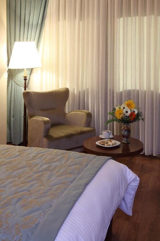 Трехместный (Стандартный трехместный номер) отеля Hotel Senbayrak City, Адана