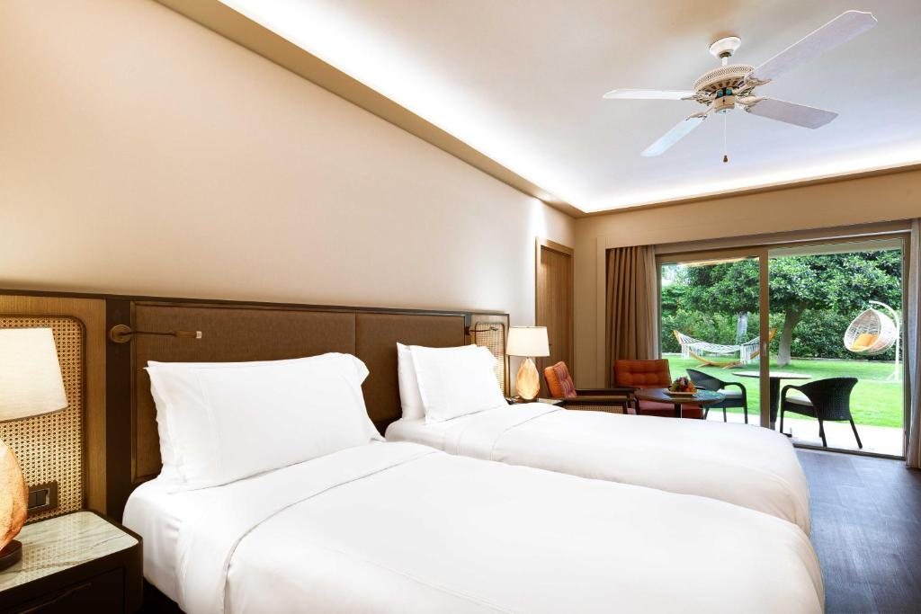 Двухместный (Двухместный номер Делюкс с 2 односпальными кроватями, вид на сад) курортного отеля Divan Bodrum Palmira, Гельтюрбюку