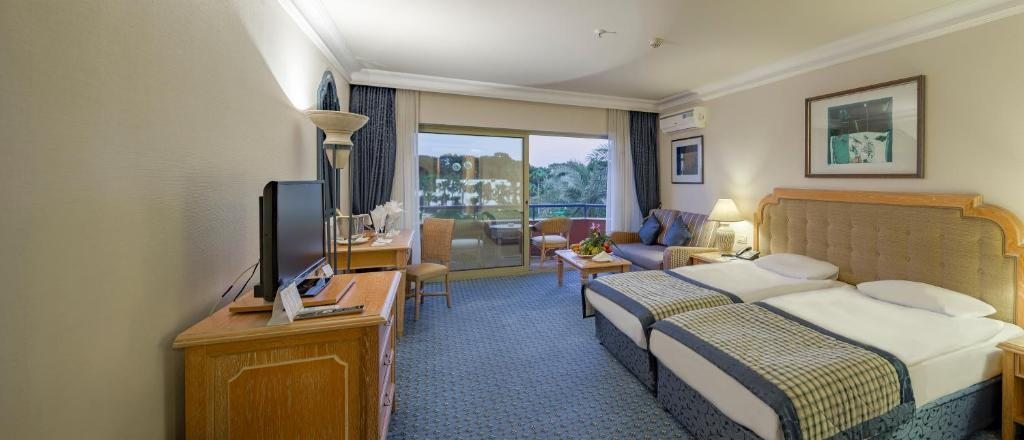 Трехместный (Двухместный номер с 1 кроватью и дополнительной кроватью (для 3 взрослых)) отеля Simena Hotel, Кемер