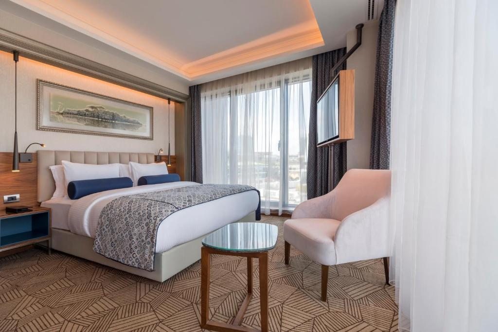 Двухместный (Представительский двухместный номер с 1 кроватью) отеля Golden Tulip Istanbul Bayrampasa, Стамбул