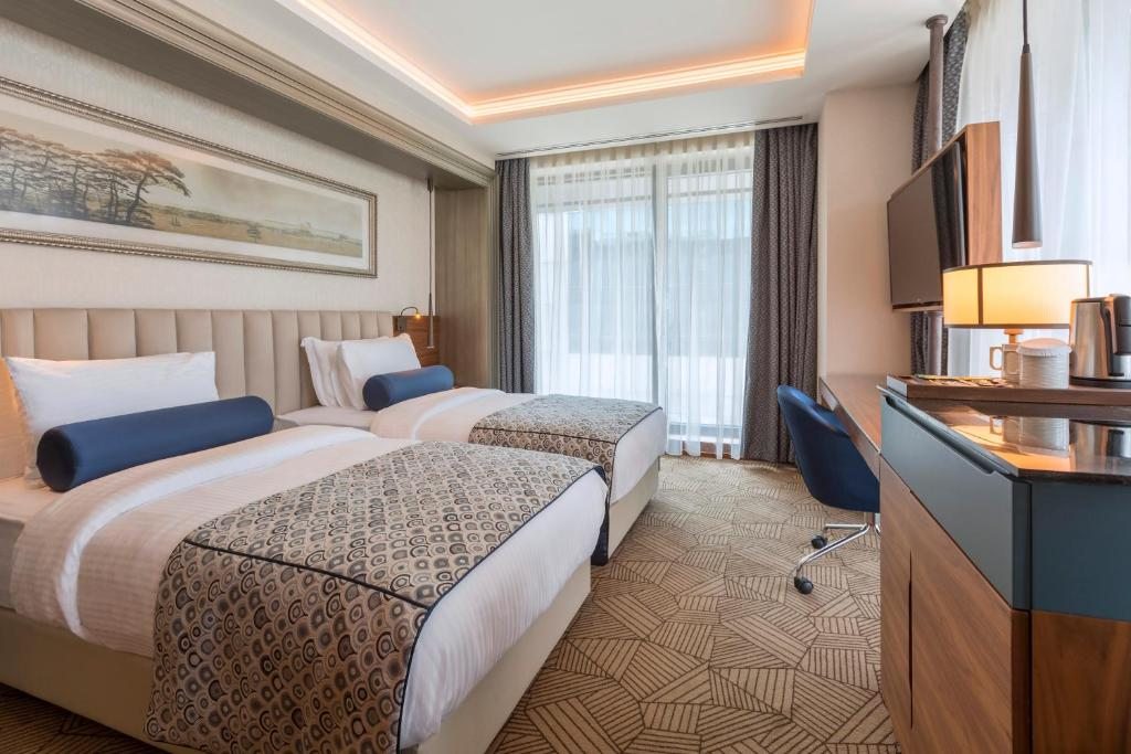 Двухместный (Улучшенный двухместный номер с 1 кроватью или 2 отдельными кроватями - Пакет услуг «Рамадан») отеля Golden Tulip Istanbul Bayrampasa, Стамбул