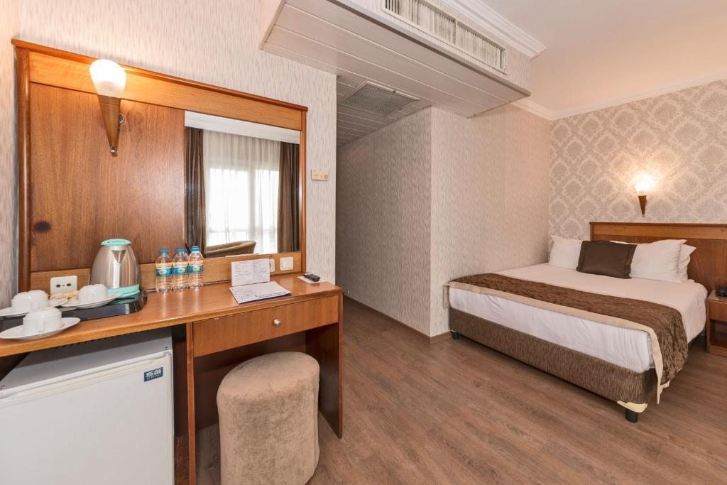 Двухместный (Двухместный номер с 1 кроватью или 2 отдельными кроватями) отеля Lion Hotel, Стамбул