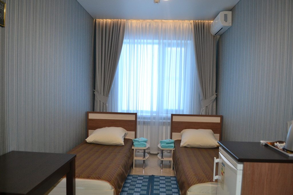 Небольшой двухместный номер с 2 отдельными кроватями. Мини-гостиница Onix
