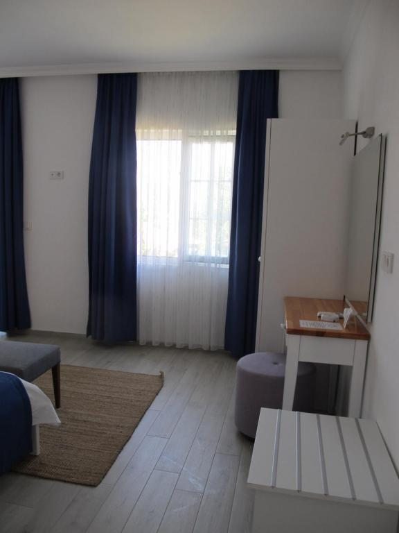 Двухместный (2-местный номер с видом на море - Пристройка) отеля Melek Hotels Selimiye, Селимие
