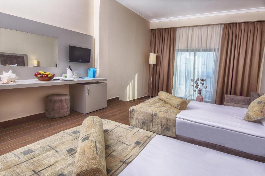Двухместный (Стандартный двухместный номер с 1 кроватью или 2 отдельными кроватями) отеля Yasmin Bodrum, Тургутреис