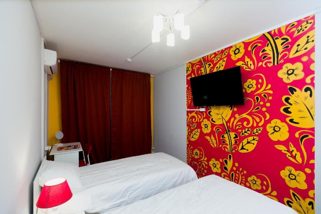 Двухместный (Кровать в номере Делюкс с 2 кроватями и балконом) хостела Малинка, Москва
