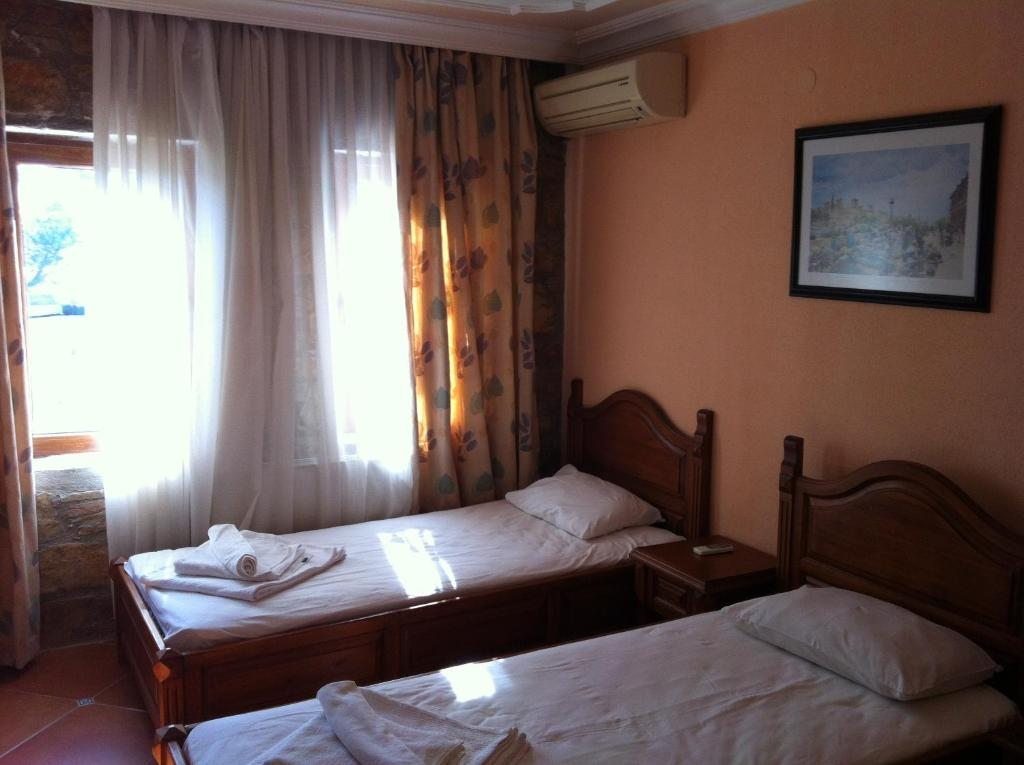 Двухместный (Двухместный номер с 1 кроватью или 2 отдельными кроватями) апарт-отеля Four Seas Apart Hotel, Тургутреис