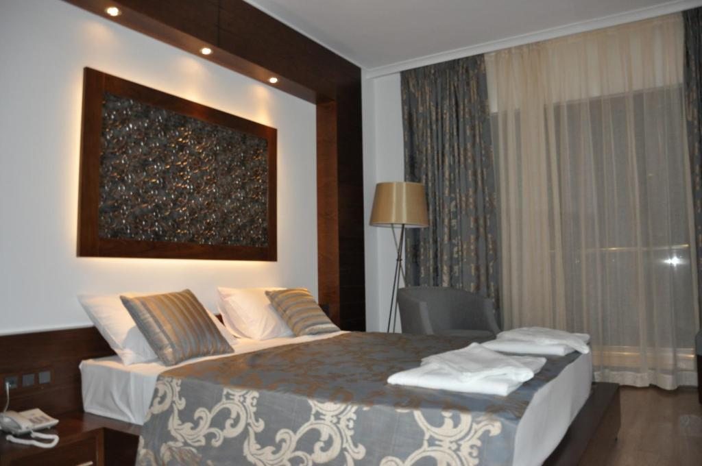 Сьюит (Стандартный люкс) отеля Hotel Turiya, Тургутреис