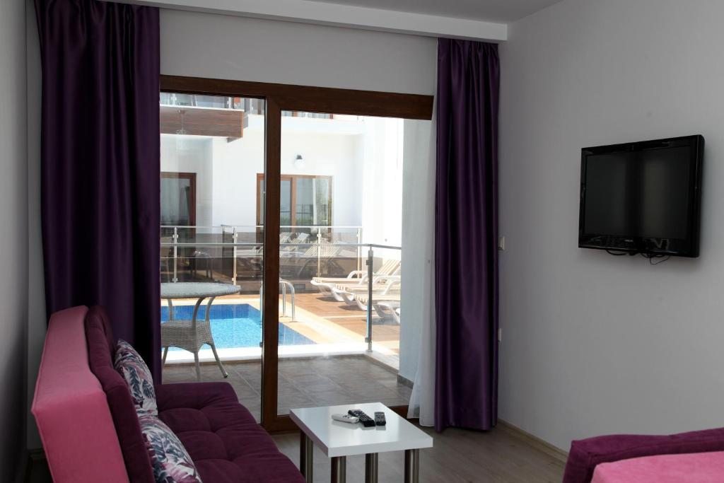 Апартаменты (Апартаменты (для 4 взрослых)) апарт-отеля Siesta Garden Apart Hotel, Тургутреис