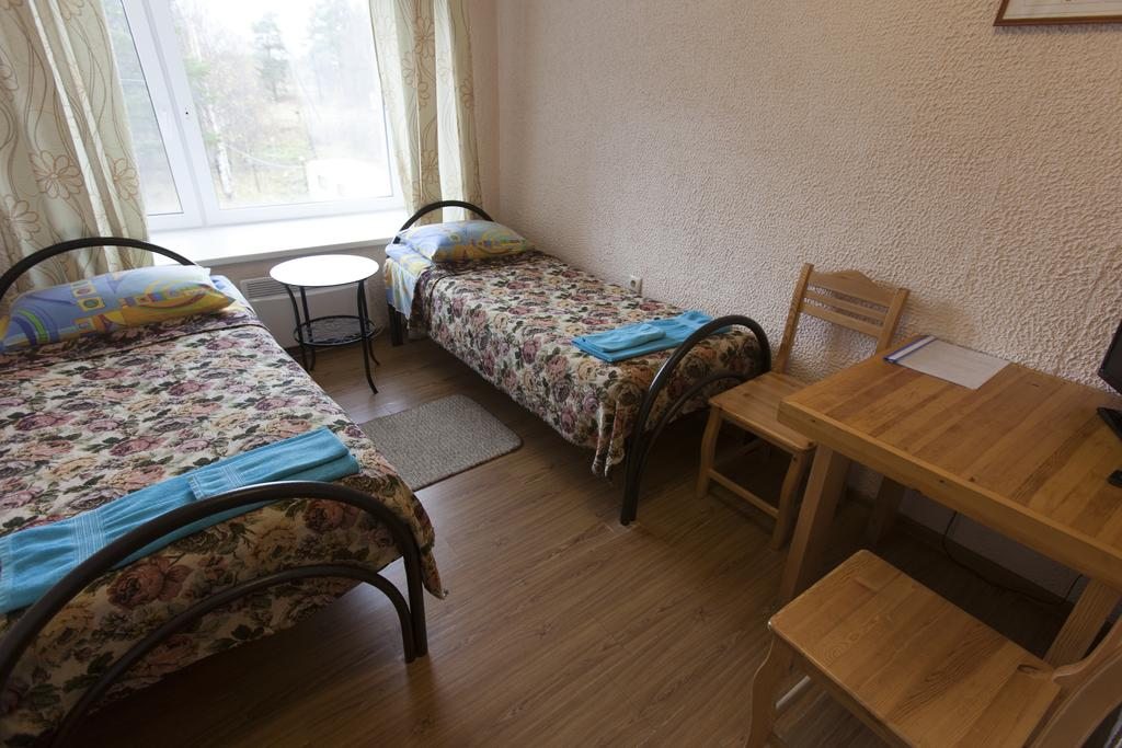 Двухместный (Двухместный номер с основными удобствами, 2 отдельные кровати) мотеля Пушной
