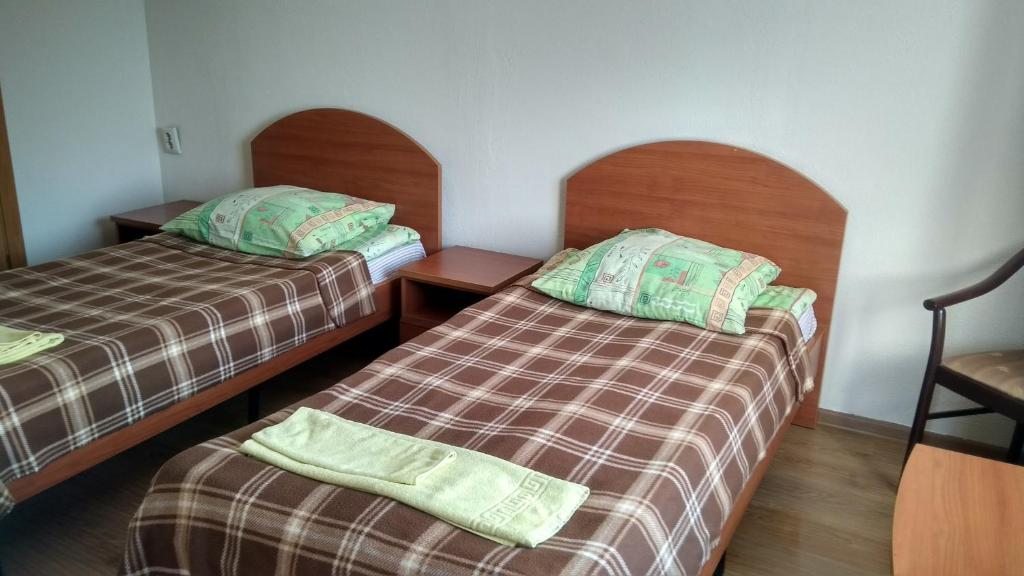Двухместный (Небольшой двухместный номер с 2 отдельными кроватями) мотеля Пушной